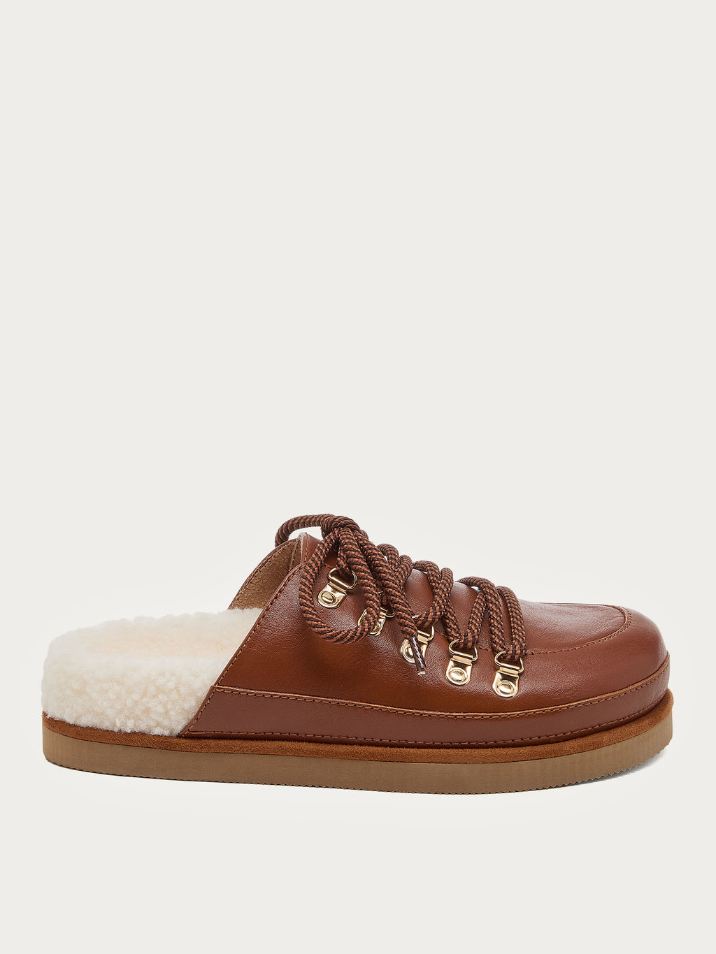 Side view of the Kelsi Dagger Brooklyn Sol auburn mule clog